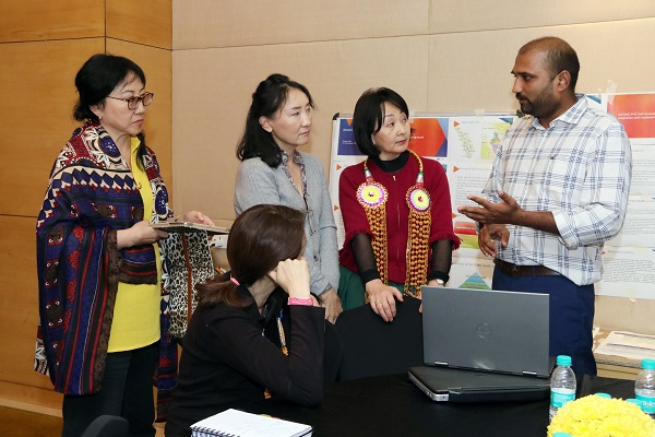 Participants discussing at a primary health care workshop in November 2018